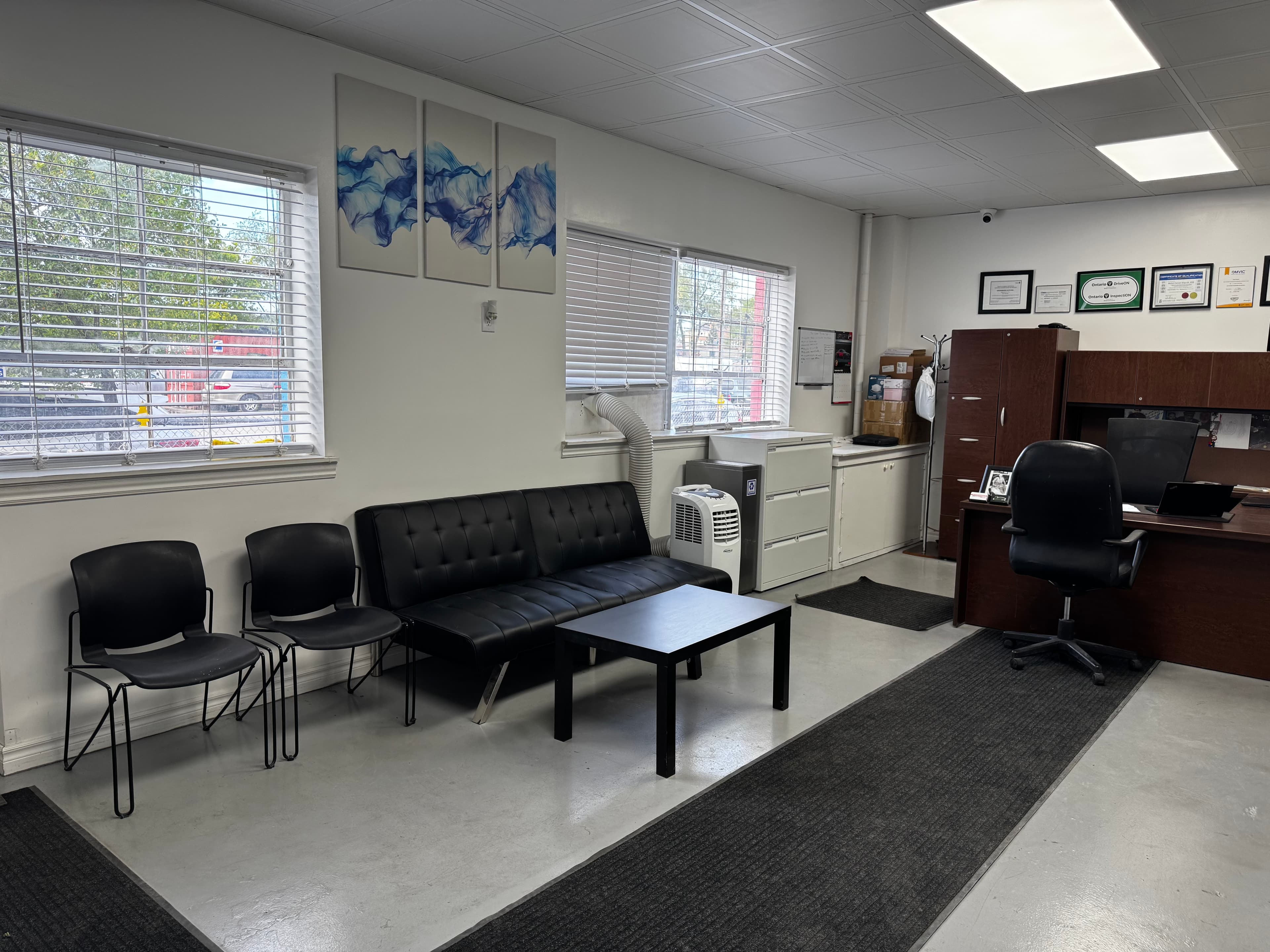 The customer reception office and waiting area inside Greensburg Auto Inc.