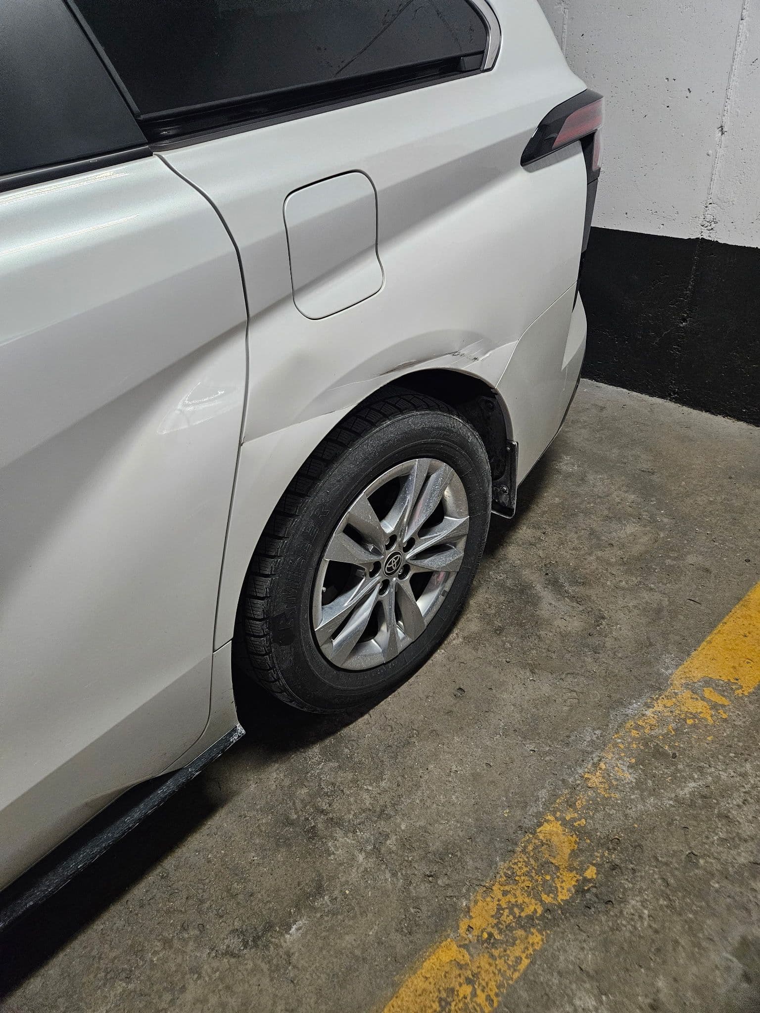 Toyota Sienna left quarter panel & door dent